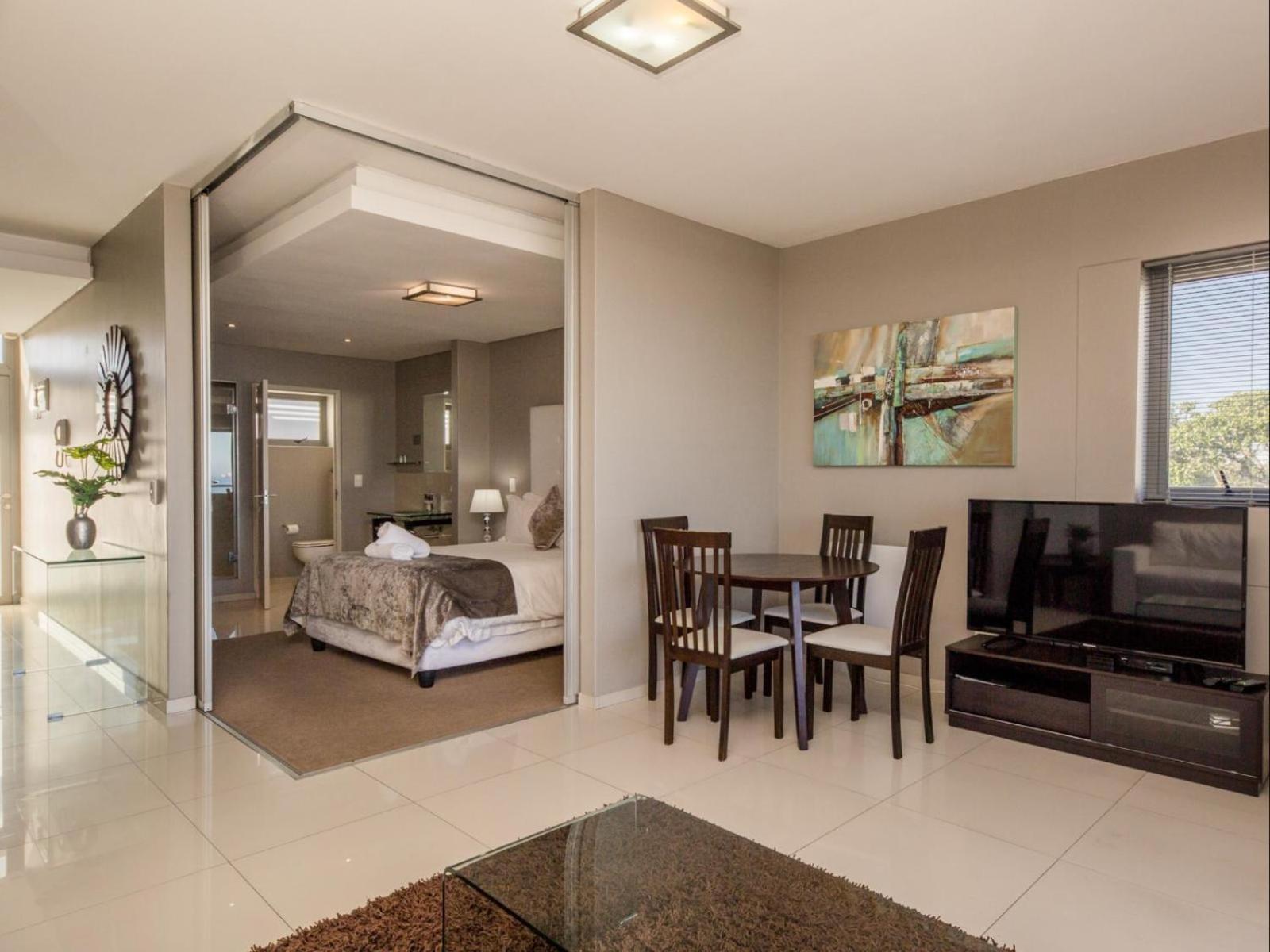 Infinity Self Catering Apartments Bloubergstrand Bagian luar foto