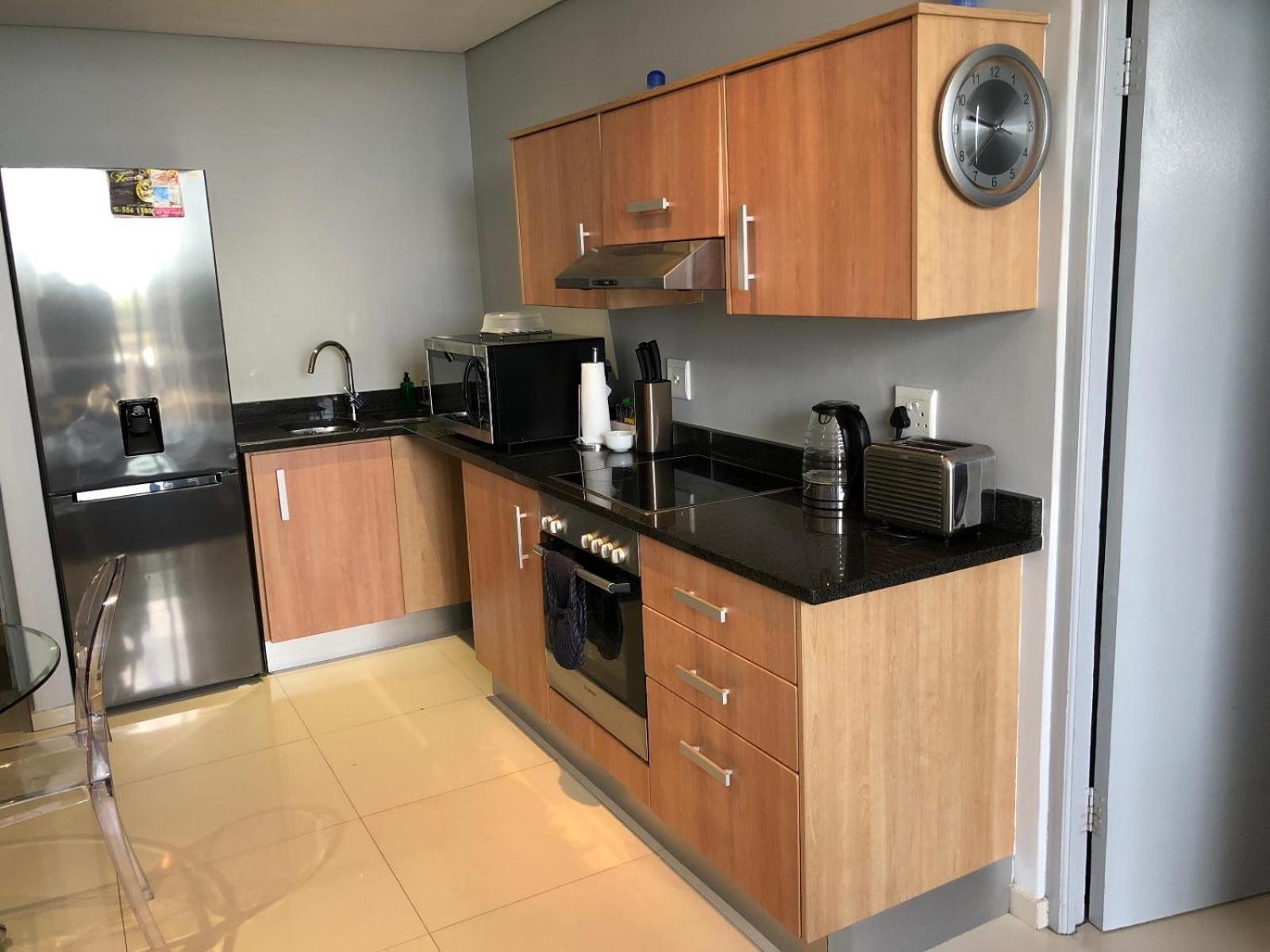 Infinity Self Catering Apartments Bloubergstrand Bagian luar foto